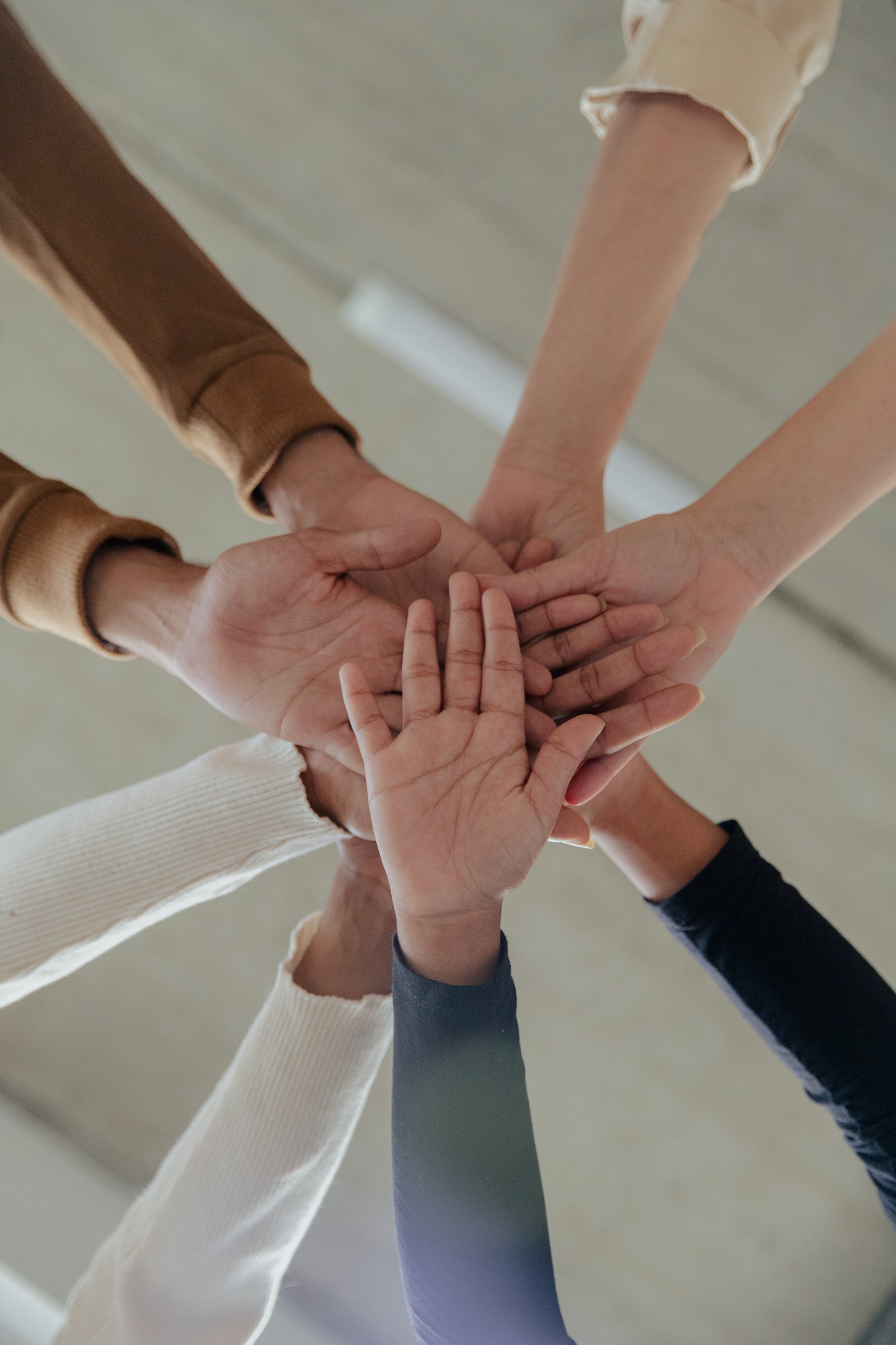 Hands of Diverse Business People Showing Unity